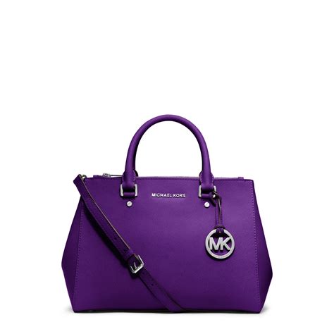 michael kors tasche und geldbörse|Michael Kors opened satchel purse.